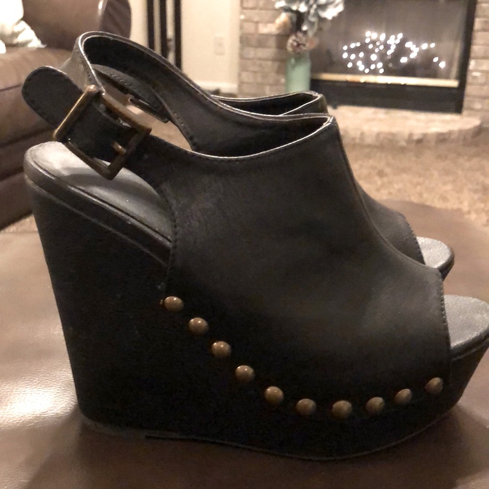 Black platform mule shoes with brass studs. Size 7
